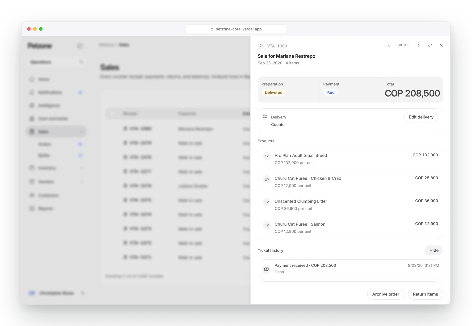 Petzone sale opened in a side panel: paid and delivered, four products and the ticket history, with archive and return actions
